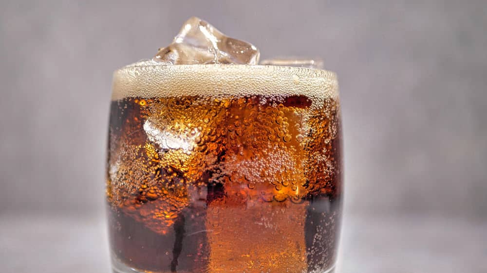 Closeup of a glass of soda with ice