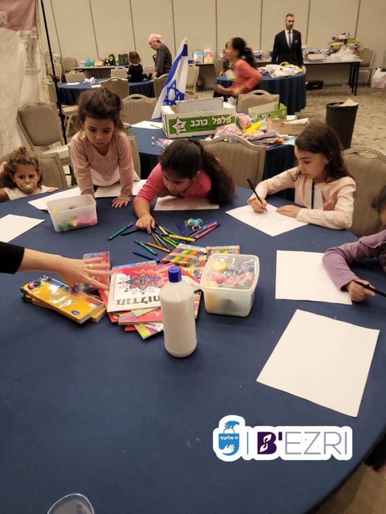Girls doing crafts provided by Yad Eliezerr