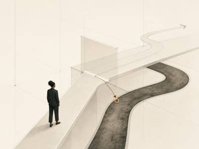 A founder-operator studies a pale installed route that splits from a darker operating path, with one cognac marker showing where behavior returns to habit.