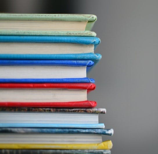 shallow focus photography of books