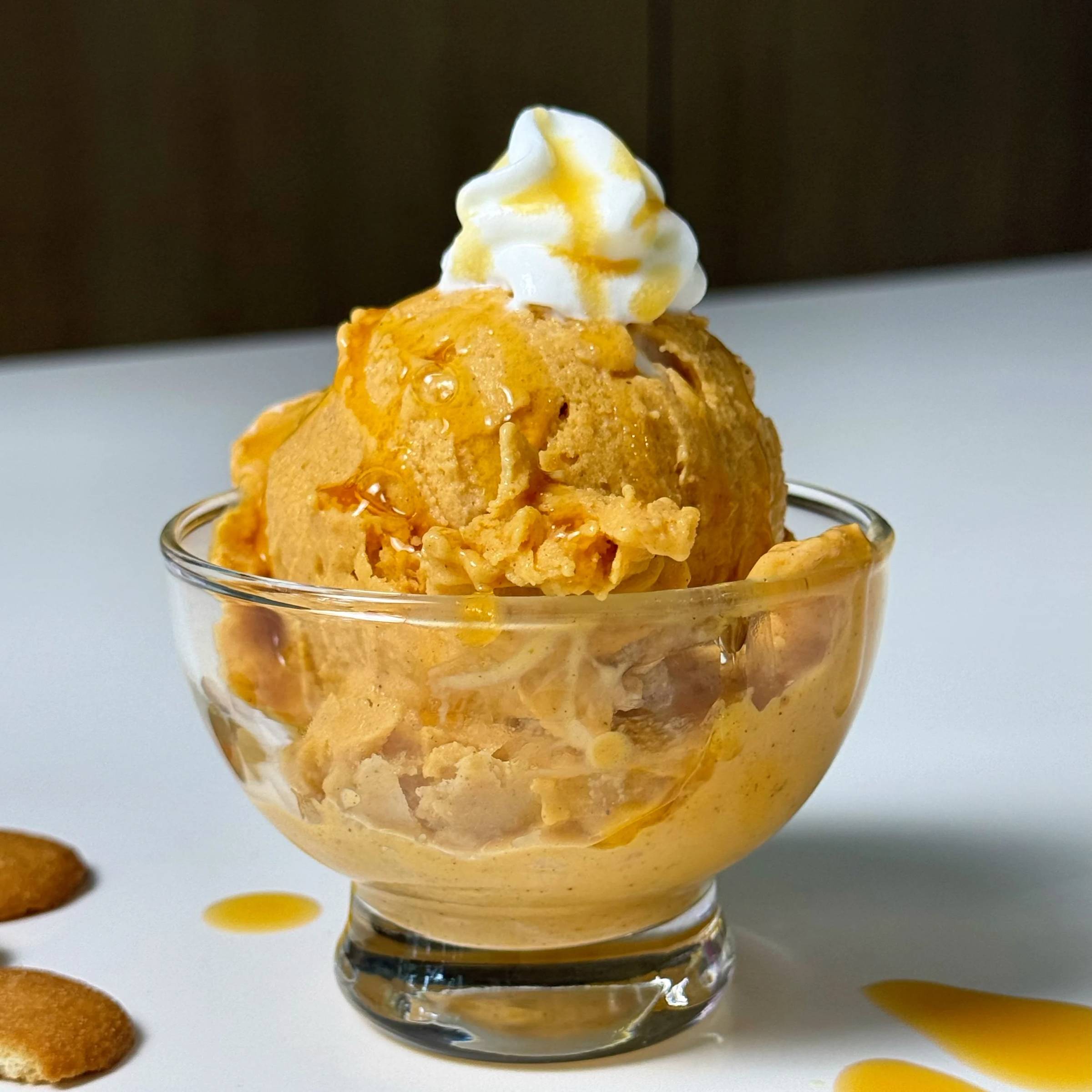 Pumpkin Pie Ninja Creami with whipped topping and syrup