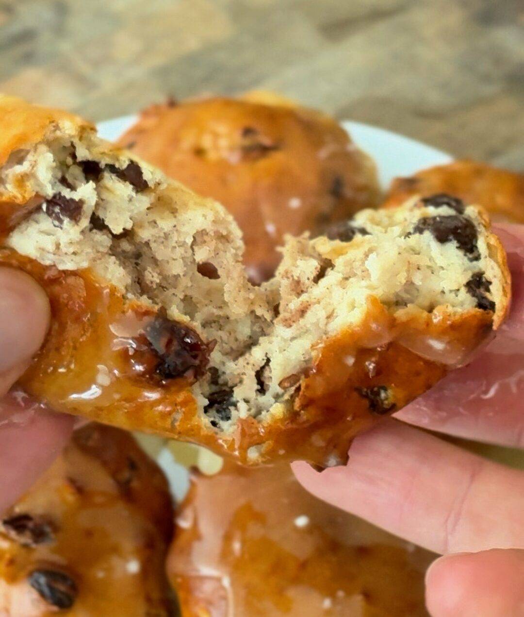 A cinnamon raisin bagel split open to show its center