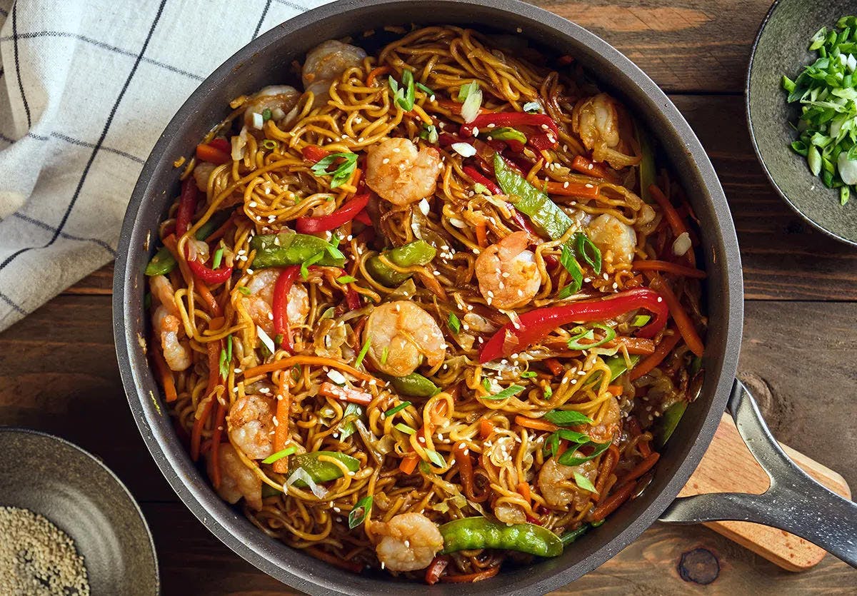 Restaurant-Style Shrimp Lo Mein in a stove pot on a wood table