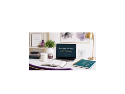 Professional home office workspace with laptop, Bible, and gold accents in deep teal and royal purple tones