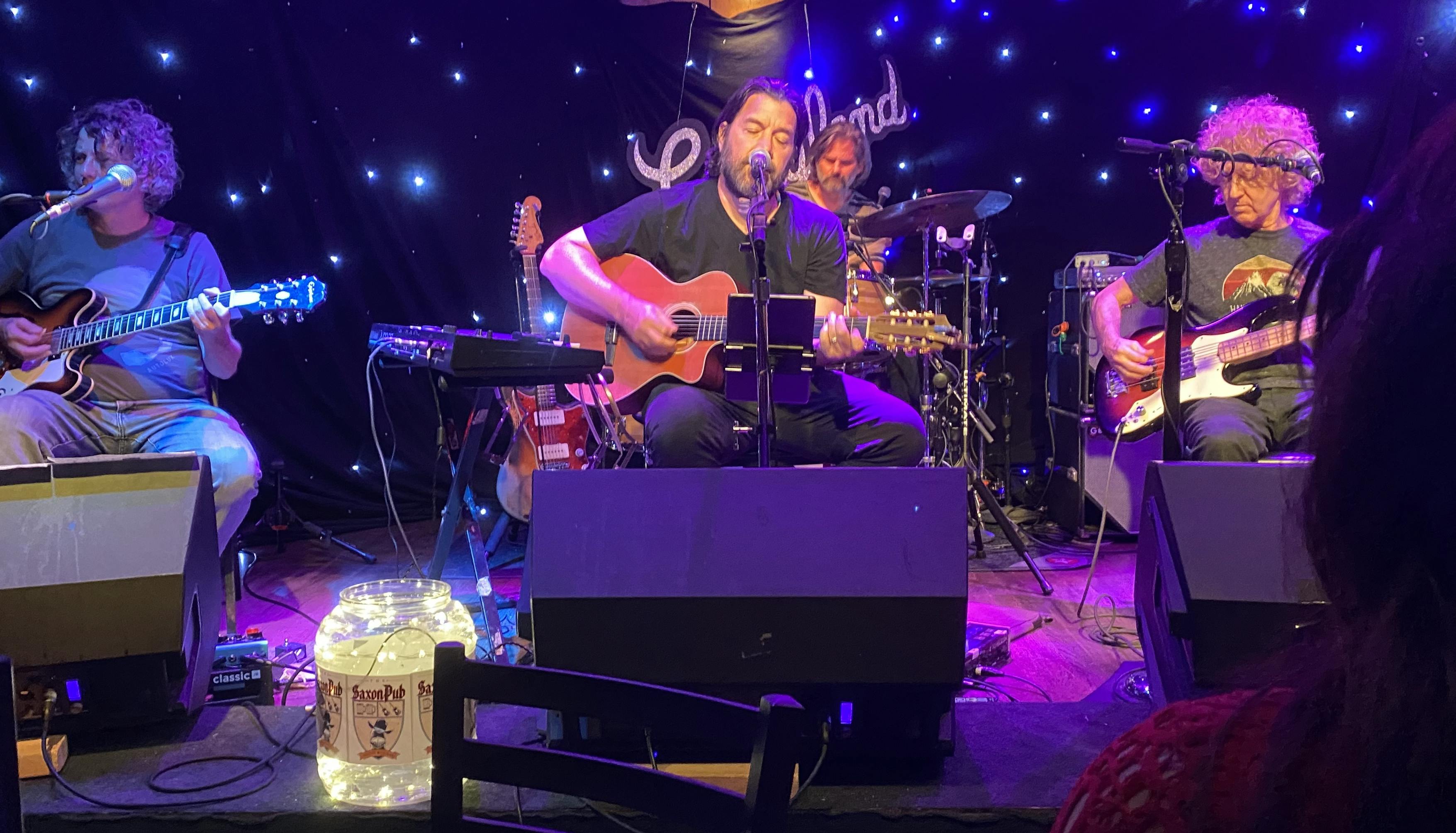 Bob Schneider performing onstage