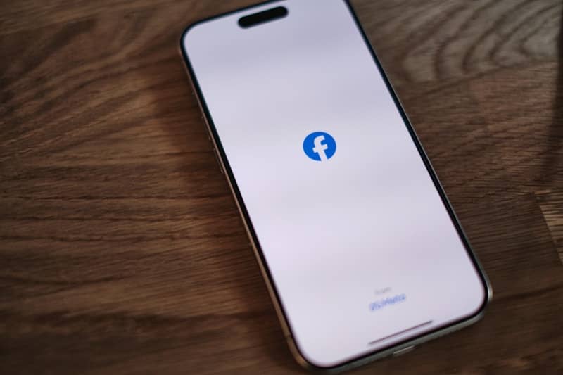 blank phone screen displaying facebook logo