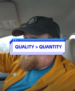 me sitting in a car with image text "quality over quantity"