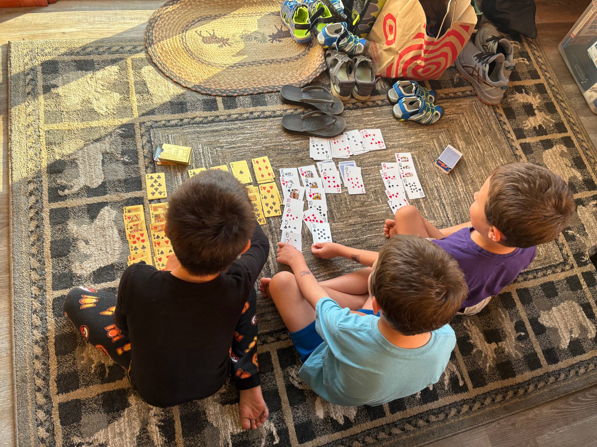 Our boys playing cards when it was too icky to go outside during our vacation. Bummer!