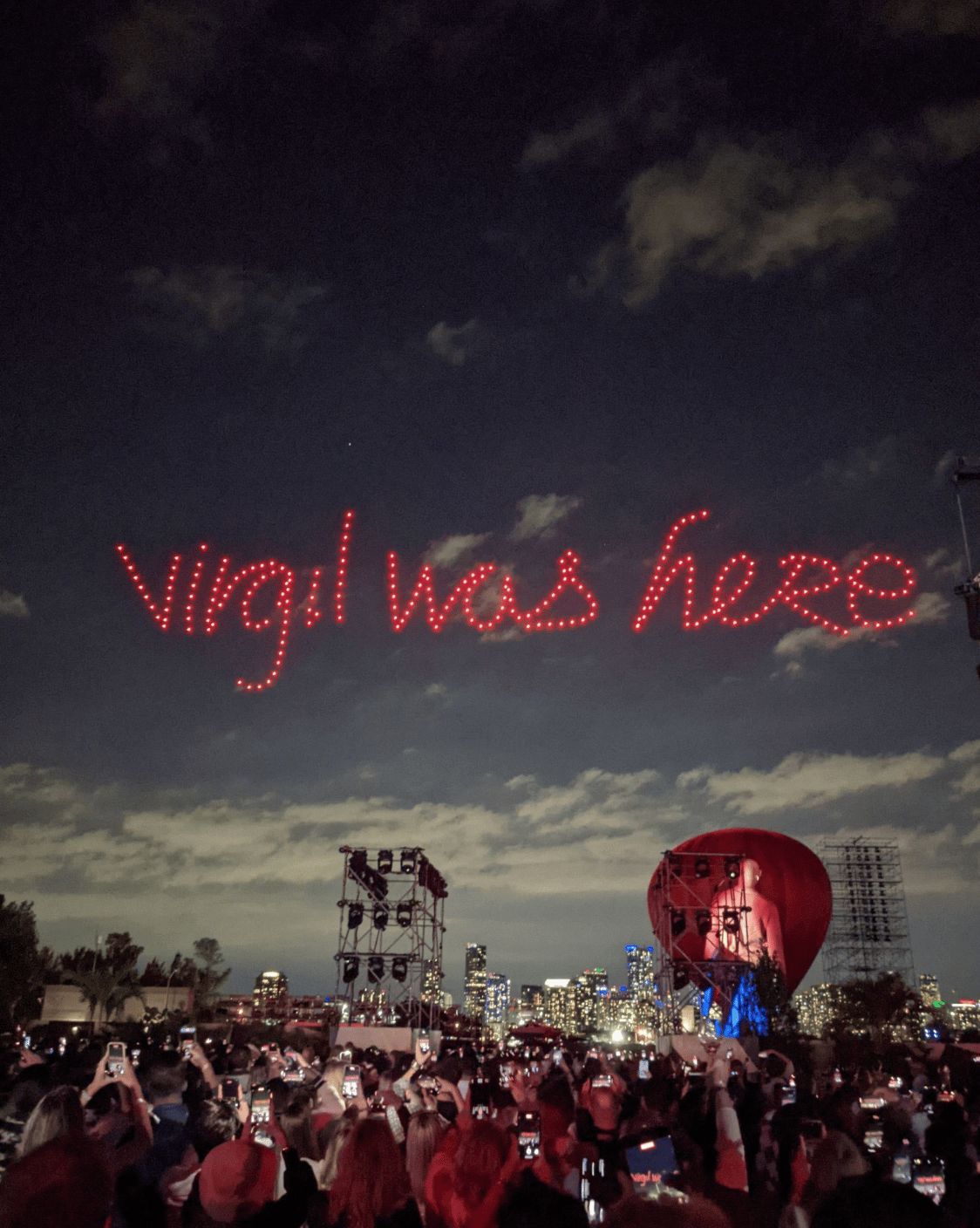 A drone show spelling out "Virgil Was Here" in the sky
