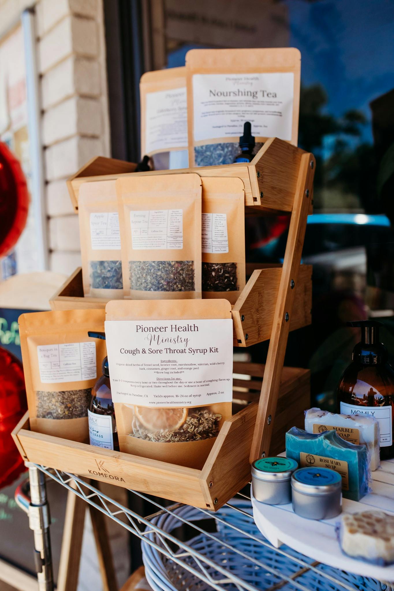 syrup kits teas and tinctures on outside cart