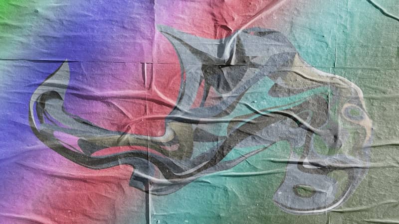 Abstract art on a crumpled paper backdrop.