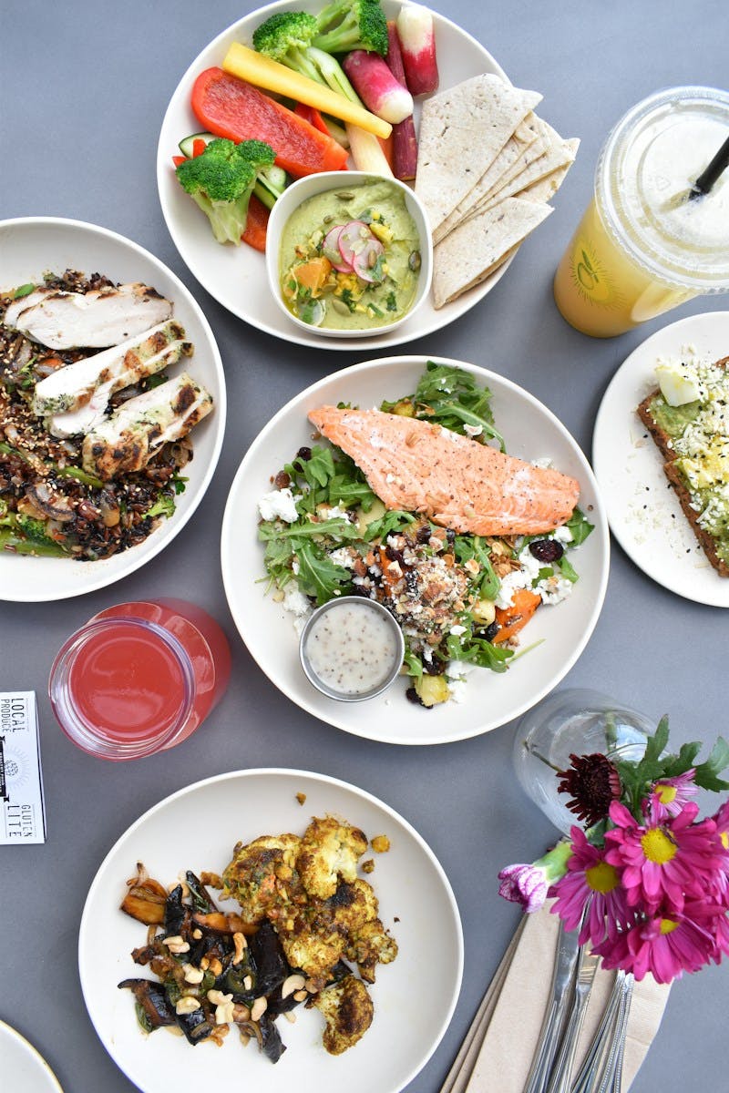 flat-lay photography of assorted-variety of stir fried and vegetable foods