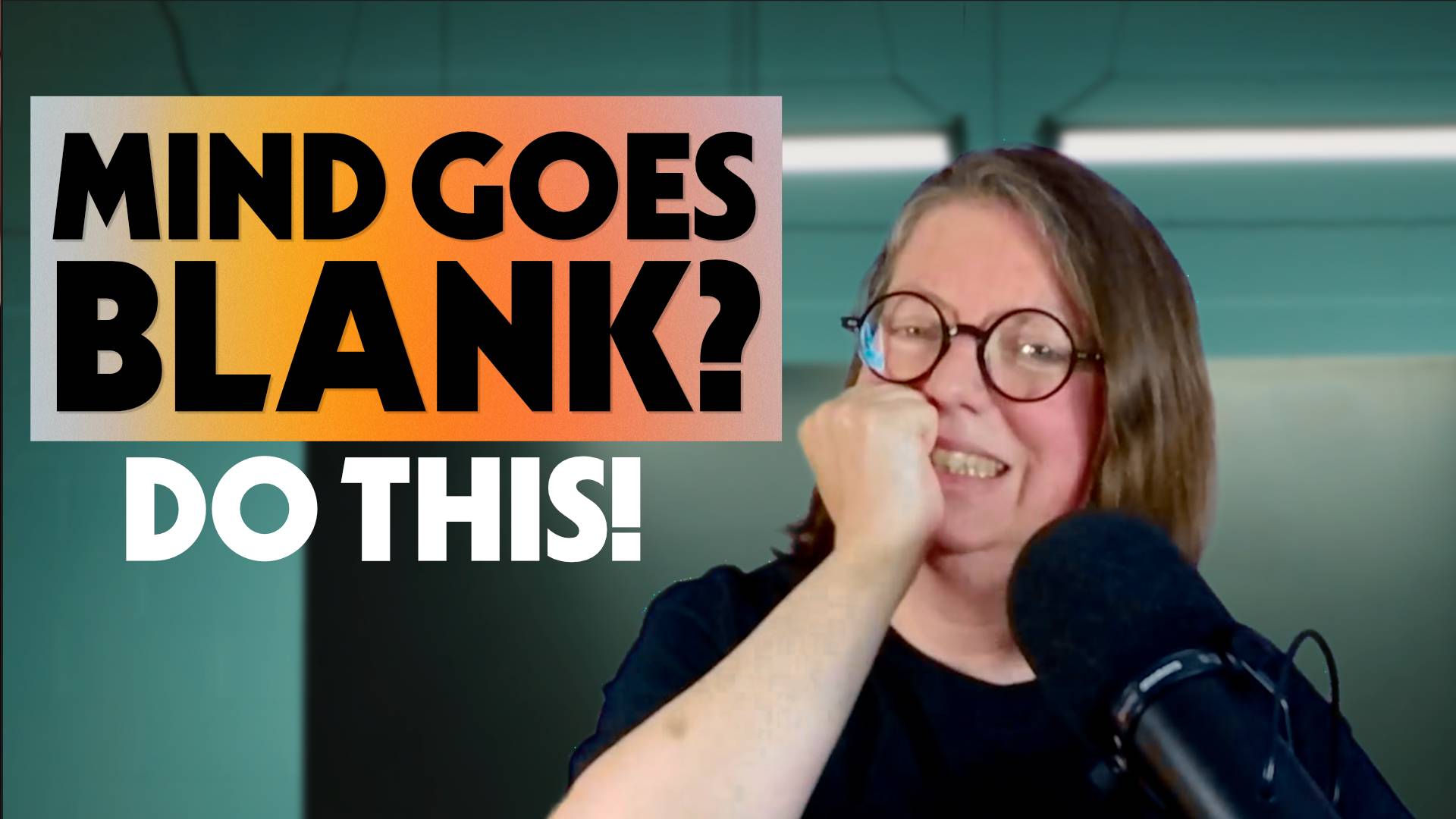 jen behind a microphone in front of a teal wall with text "Mind Goes Blank? Do this!"