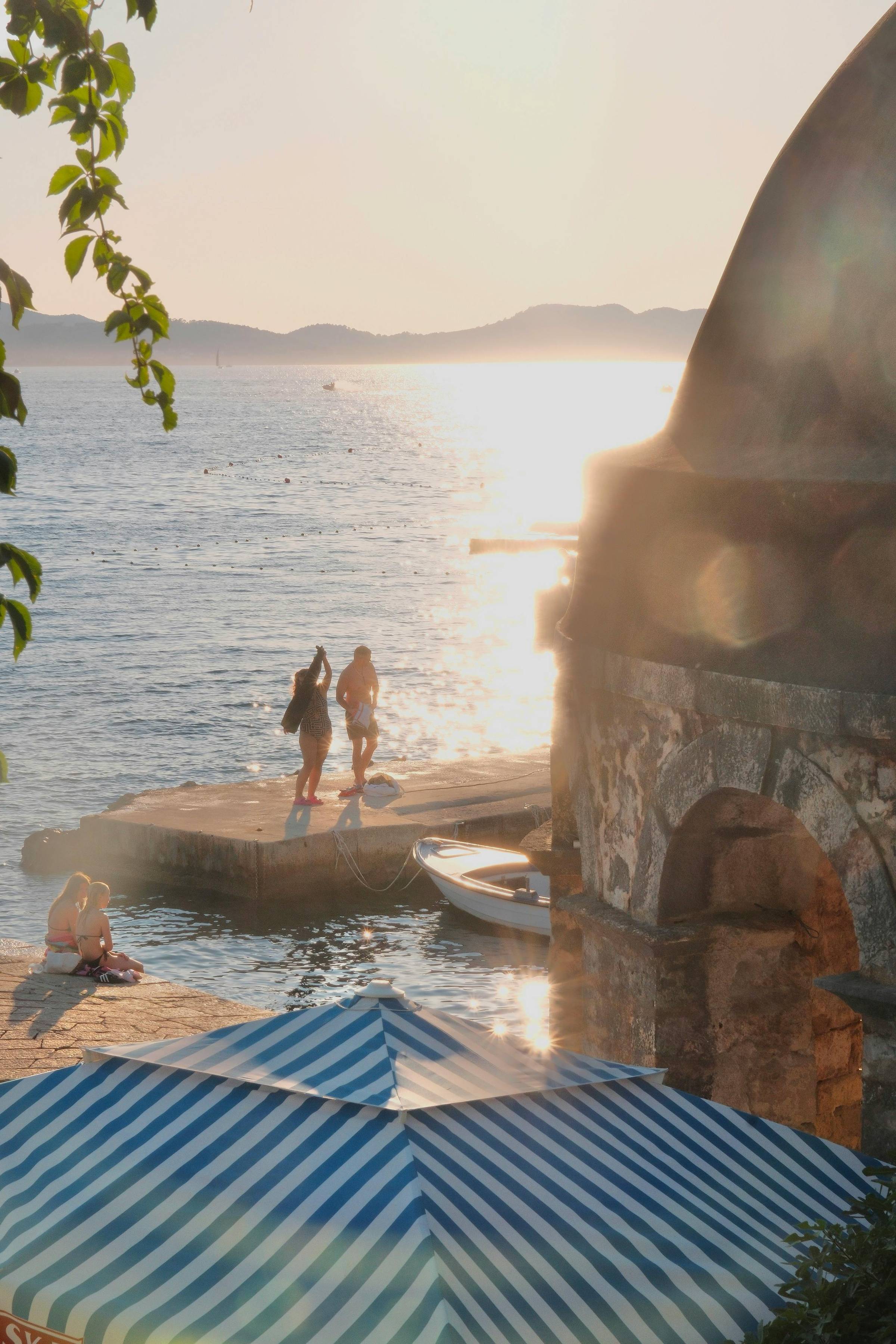 two people enjoying a boat dock in Croatia