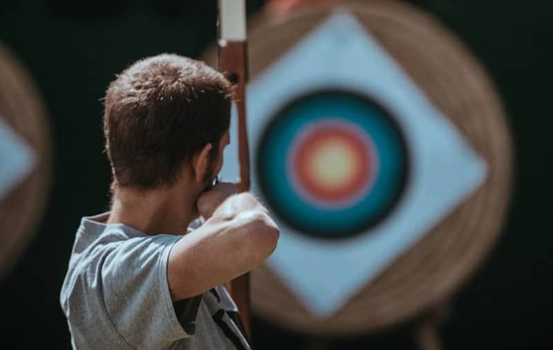 white and brown composite bow