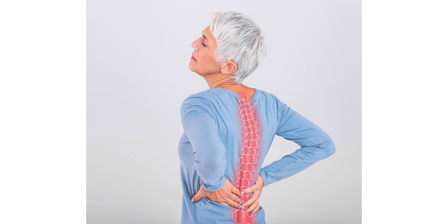 Woman with hands on lower back