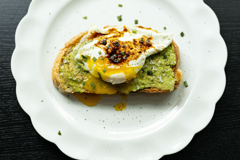 a piece of delectable avocado toast