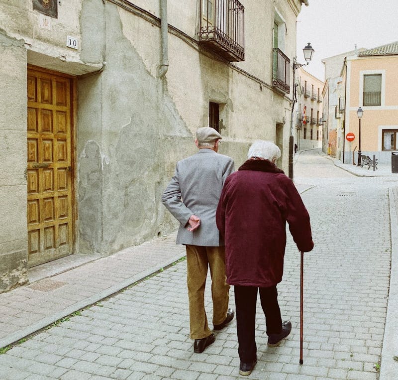 Elderly Couple Holding Hands