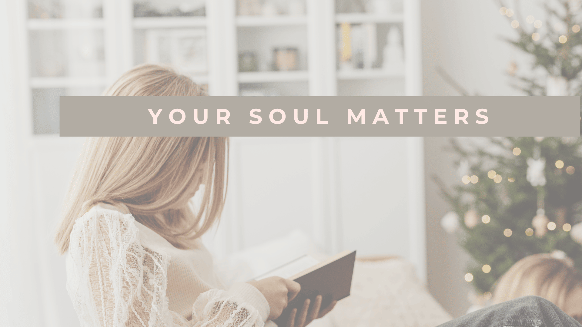 Woman reading a book in living room