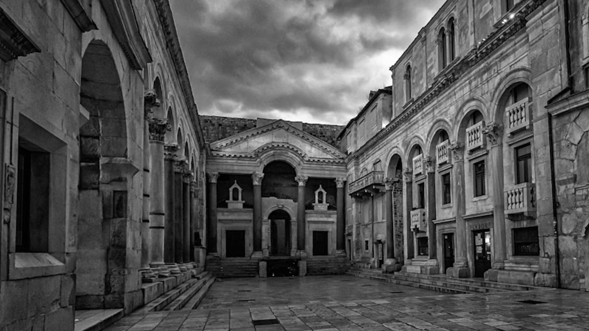 grayscale photo of concrete building