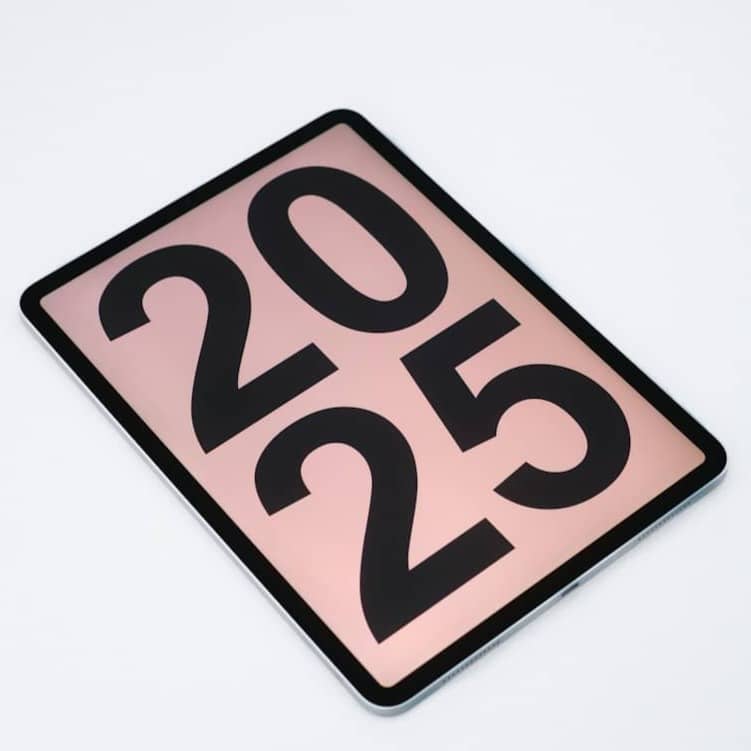 A pink and black sign that says 2012 on it