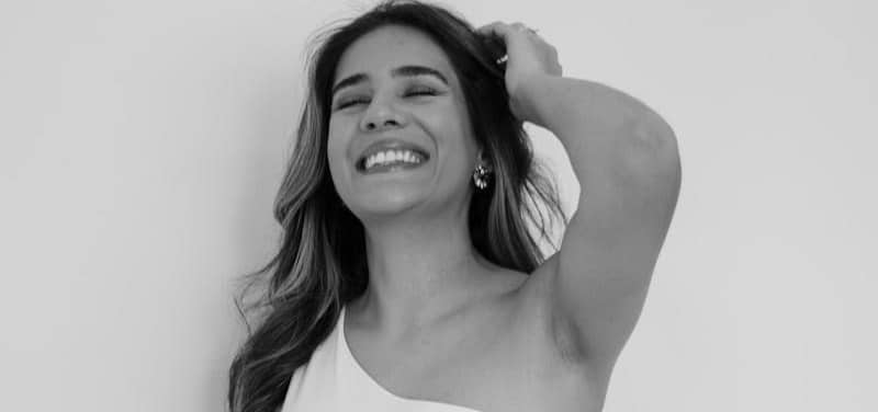 Black and white picture of a woman smiling