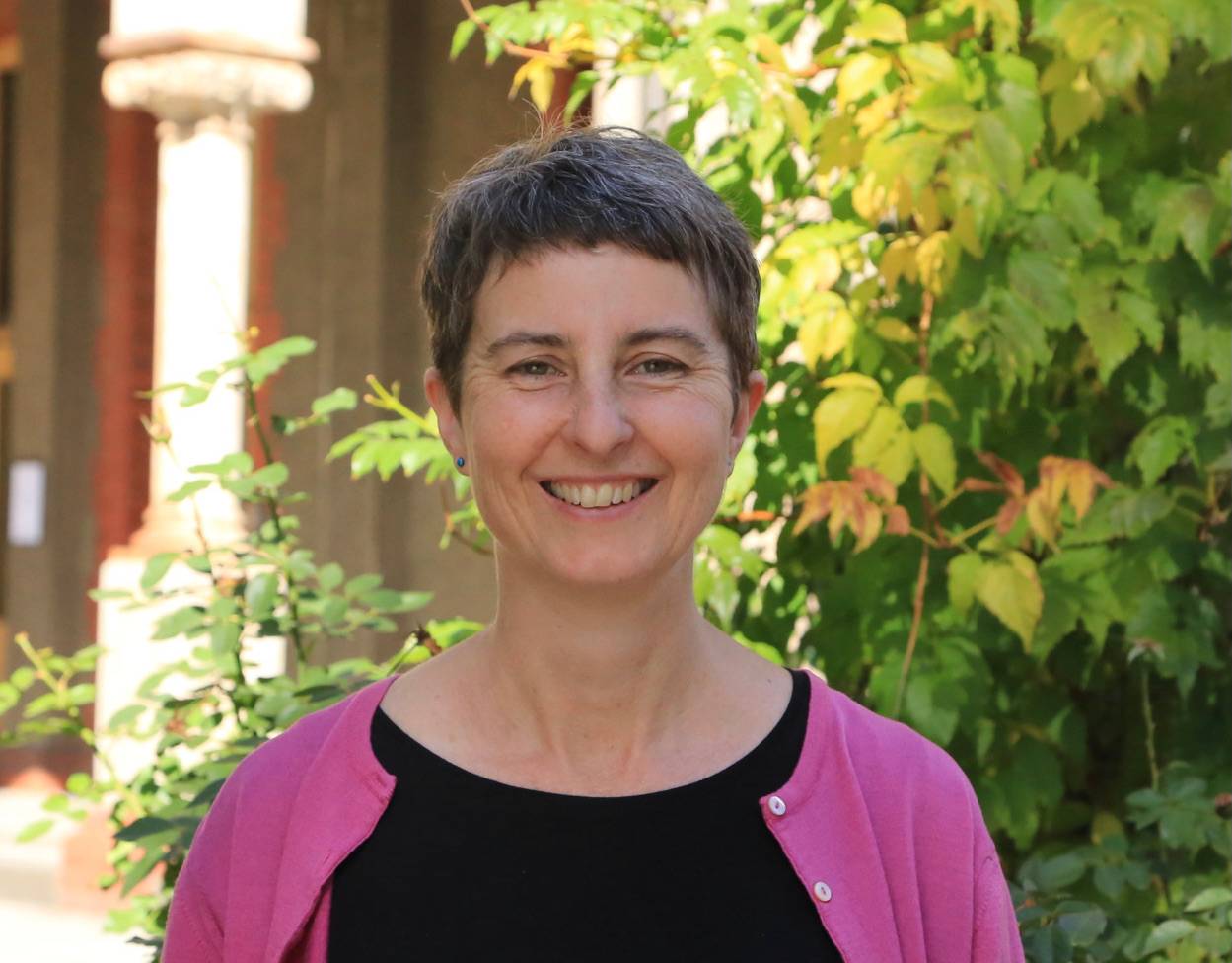 Janine McCarthy standing in a garden