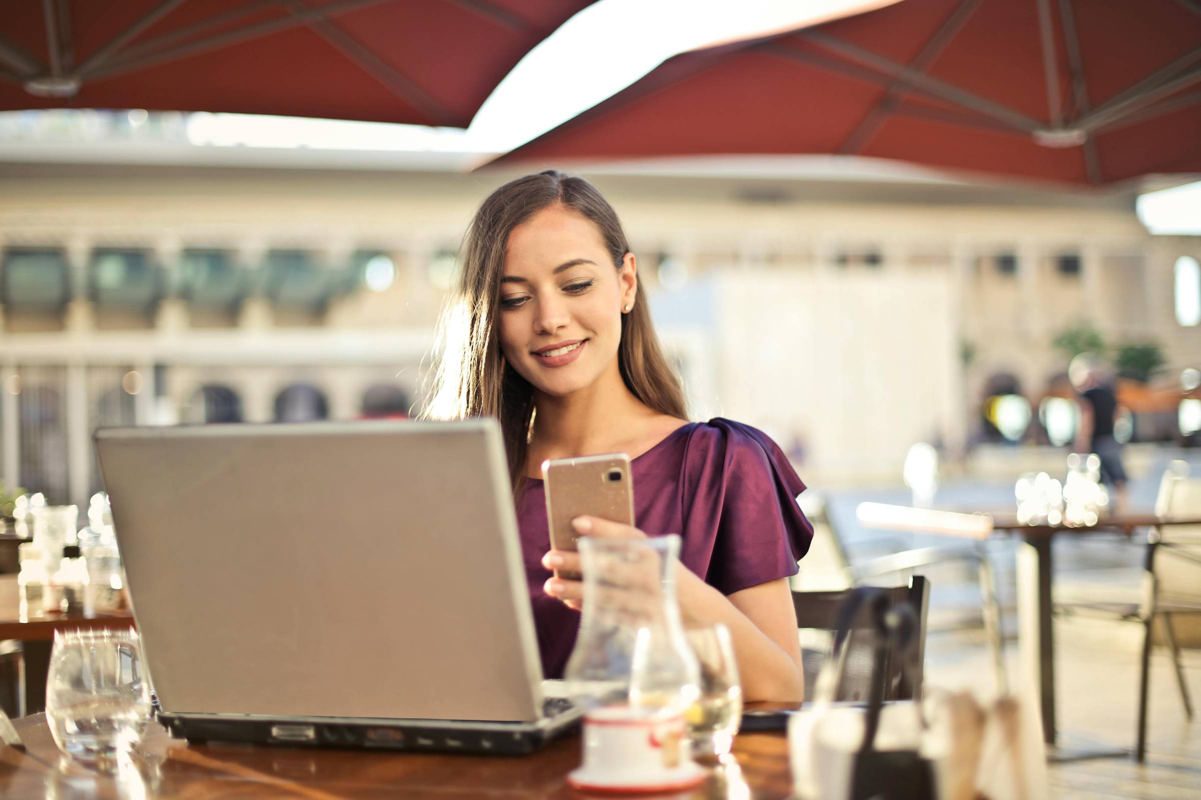 Smiling Woman at Laptop