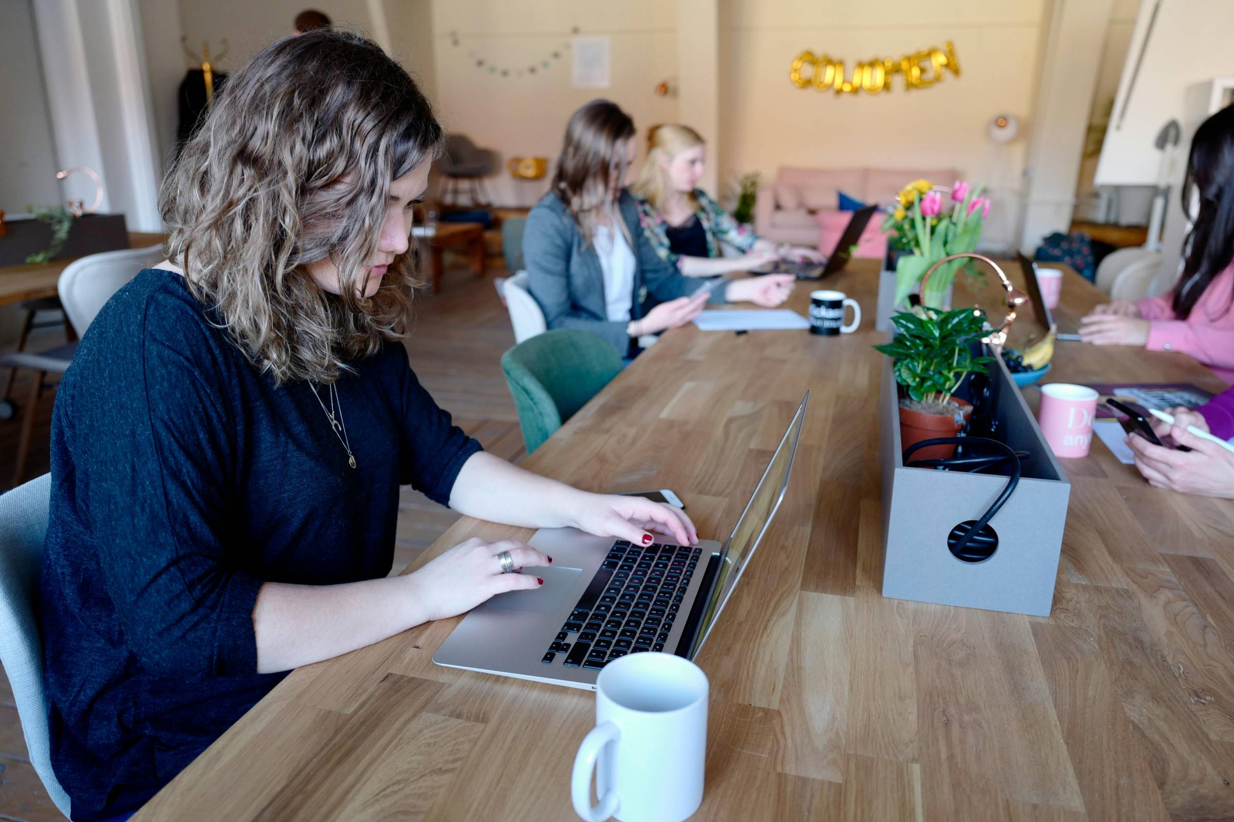Women Working at Table