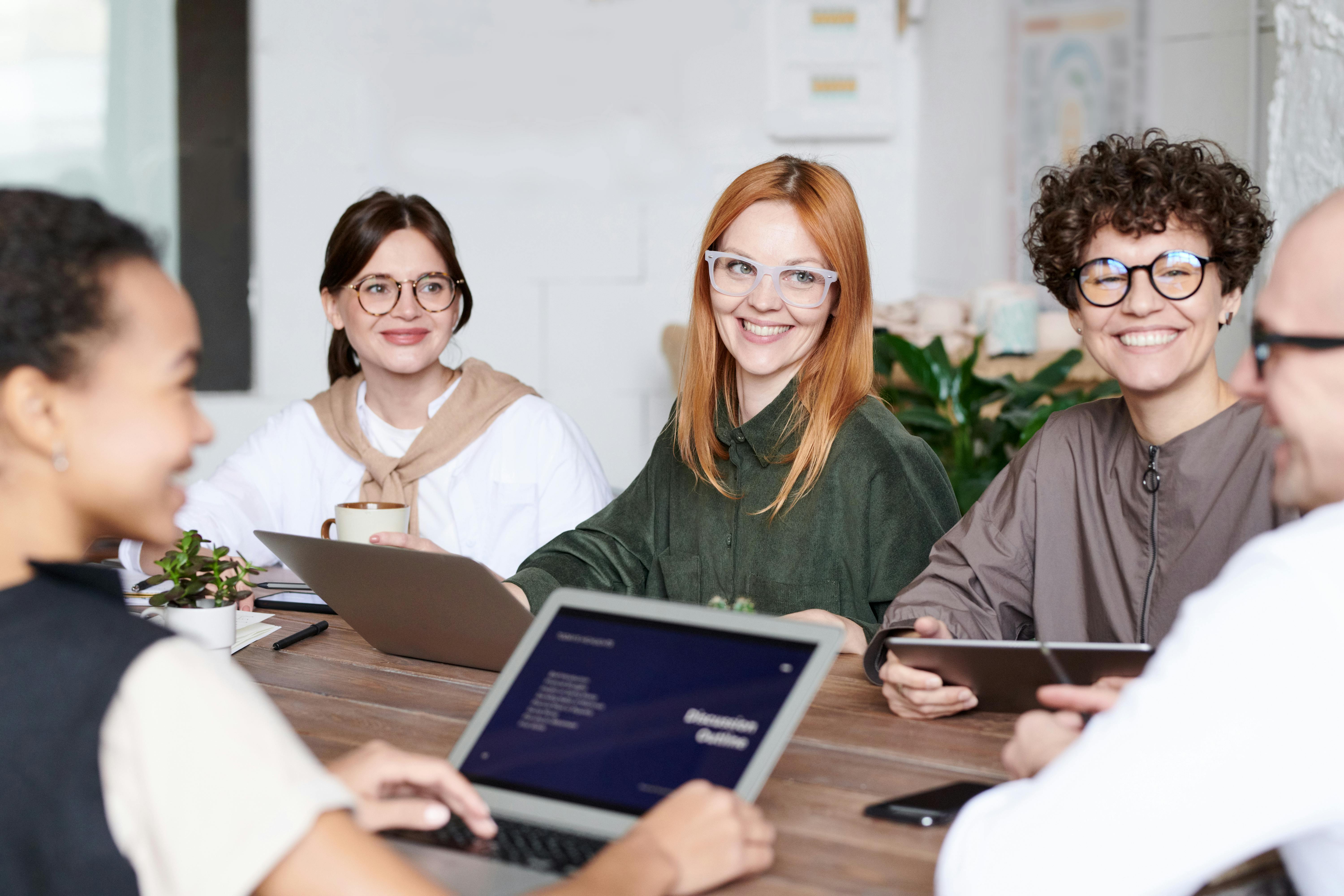 Employees Laughing at a Table