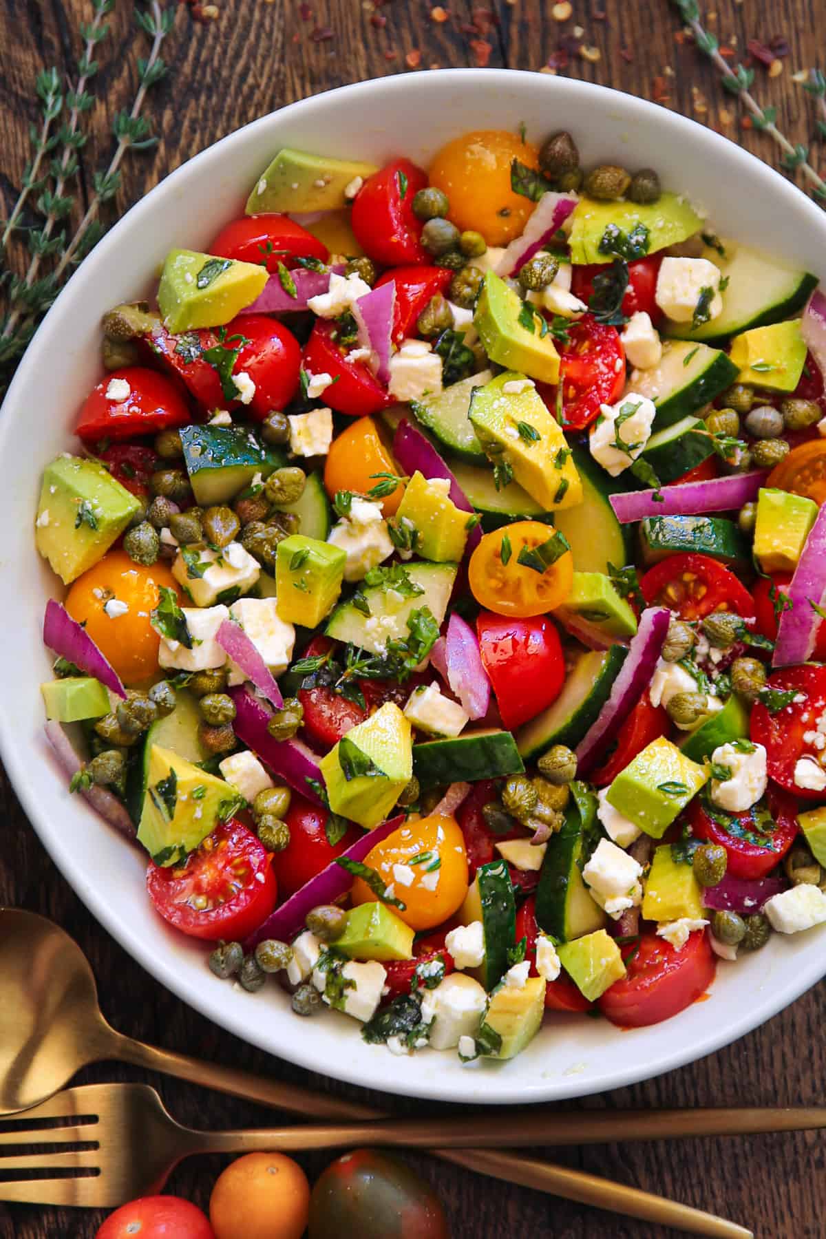 Greek Salad with Tomatoes, Cucumber, Avocado, Capers, Red Onions, and Feta Cheese