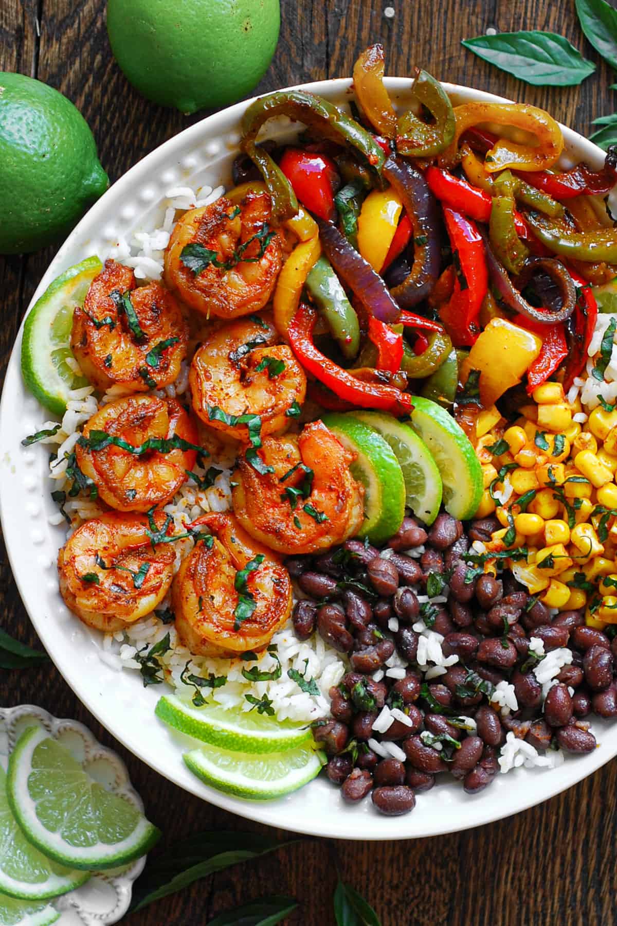 Shrimp Fajita Bowls with roasted bell peppers, rice, black beans, and corn.