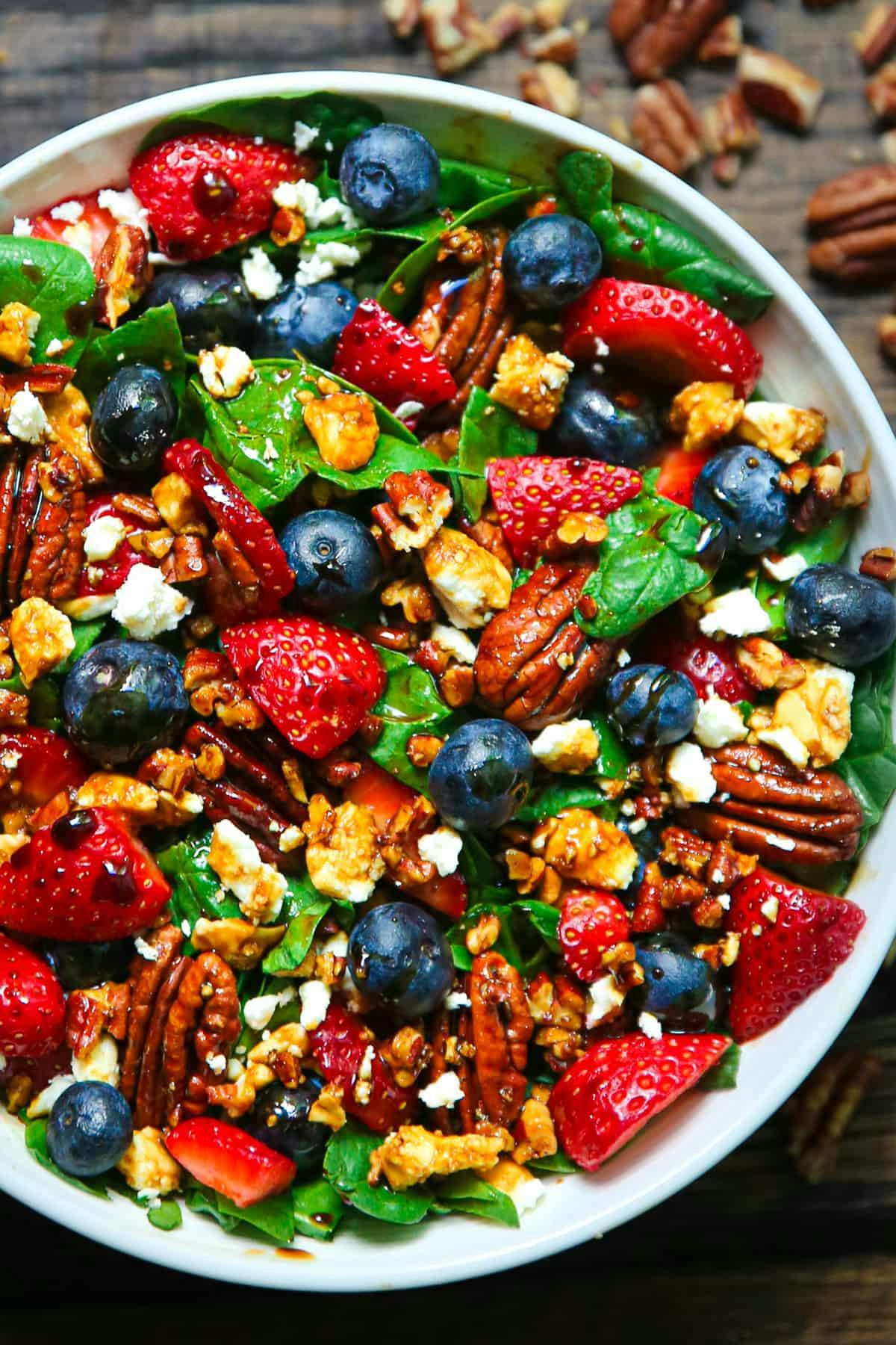 Strawberry Spinach Salad with Feta, Pecans, and Balsamic Dressing.