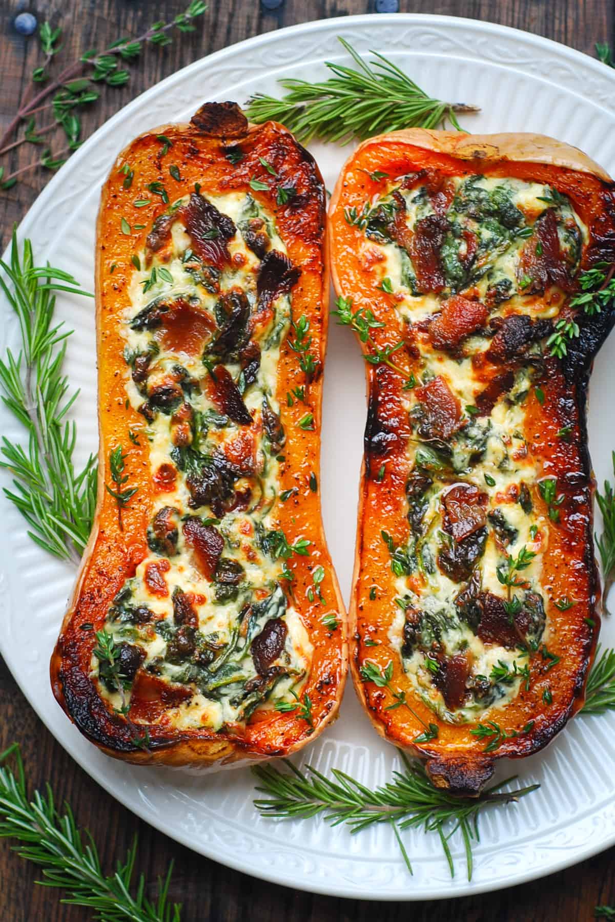 Stuffed Butternut Squash with Spinach, Bacon, and Cheese on a plate.