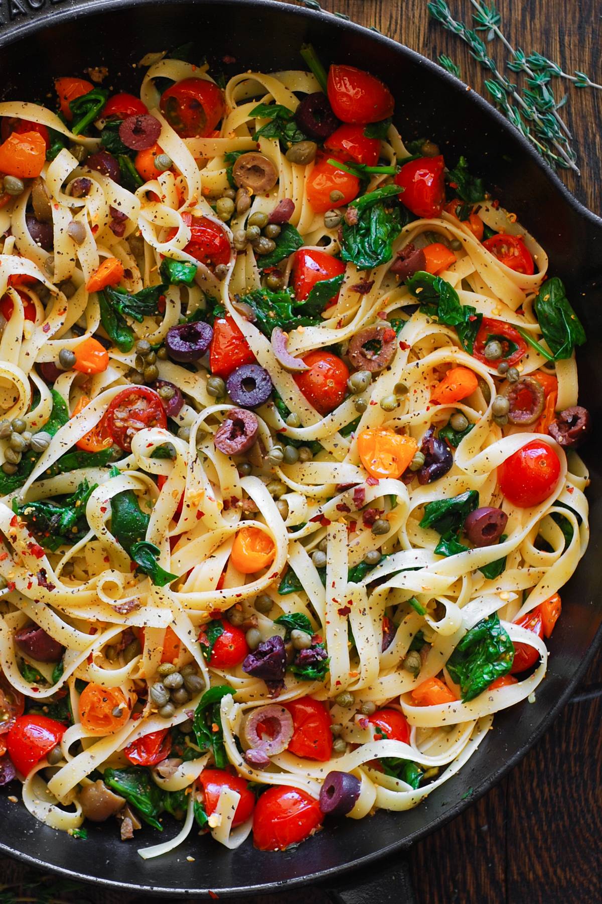 Tomato and Spinach Pasta with Kalamata & Green Olives, Capers, Garlic, and Lemon.