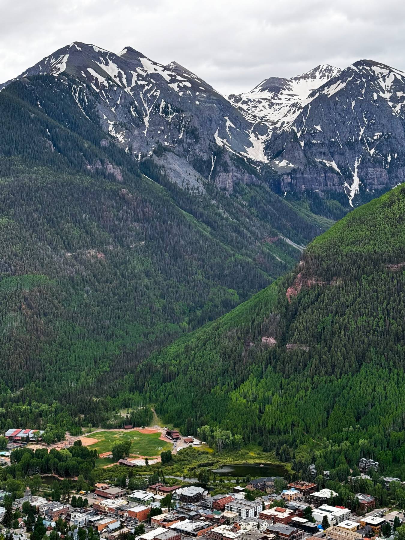 Small Colorado town surrounded by mountains.