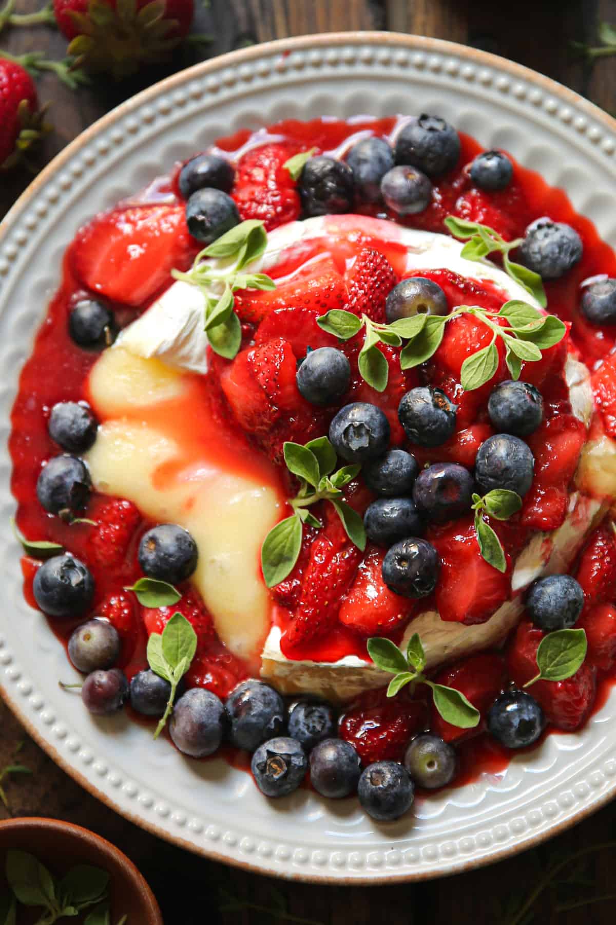 Baked Brie with Honey-Lemon Cooked Strawberries and Blueberries