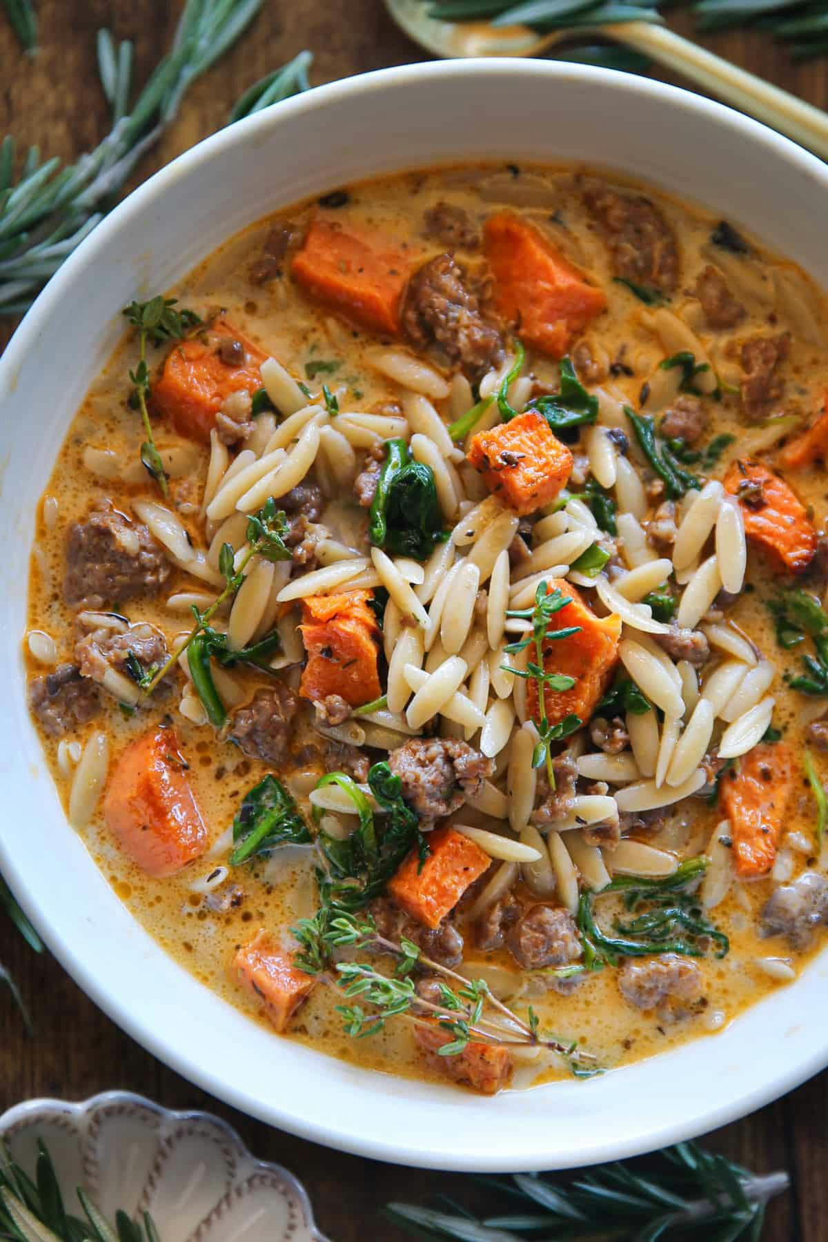 Creamy Butternut Squash and Sausage Soup with Orzo and Spinach.