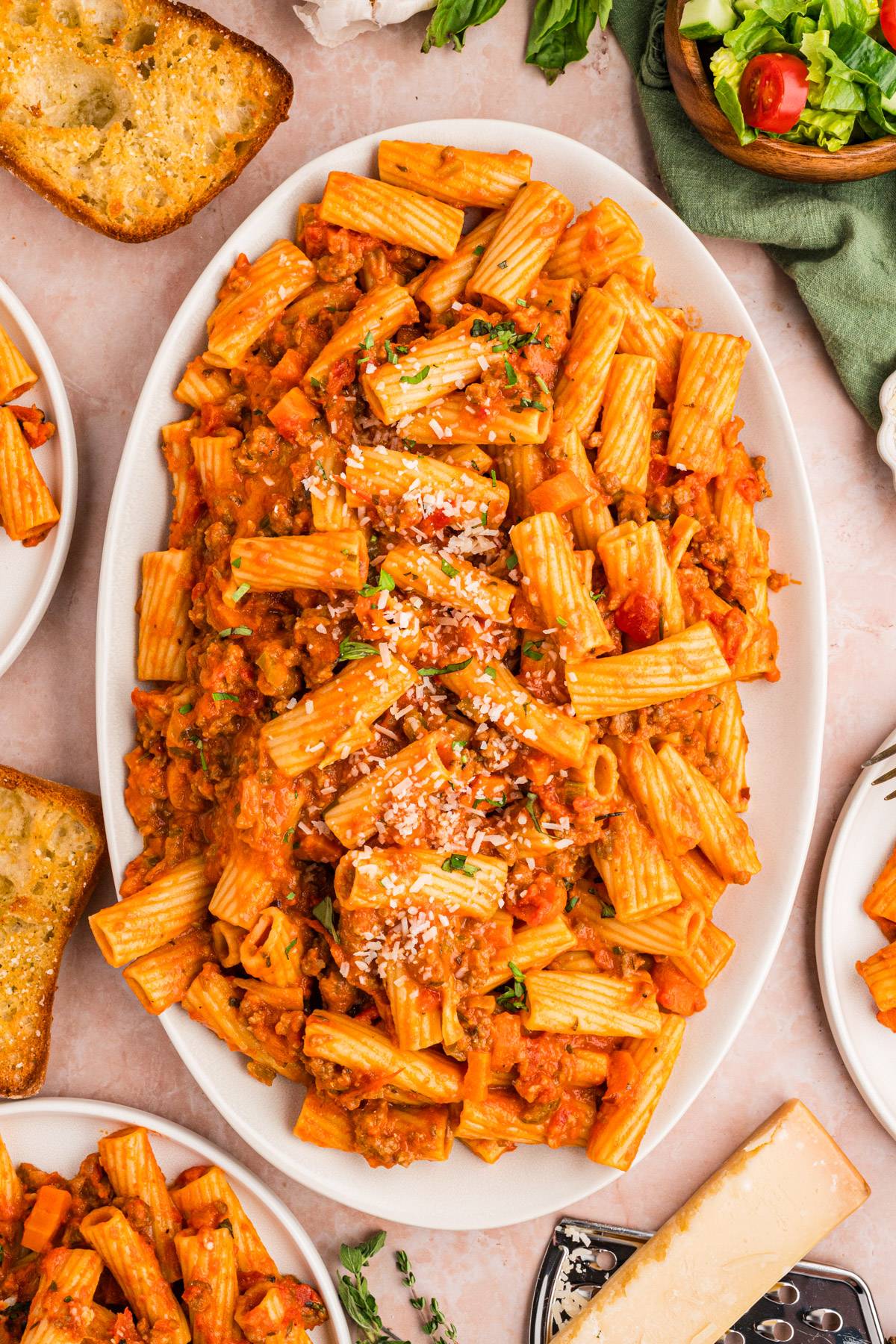 Sausage Ragu Pasta on a white platter.