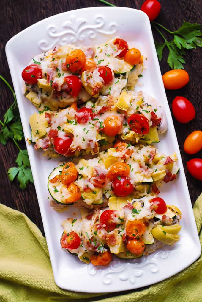 One-Pan Baked Italian Chicken and Vegetables ( artichokes, tomatoes, zucchini).