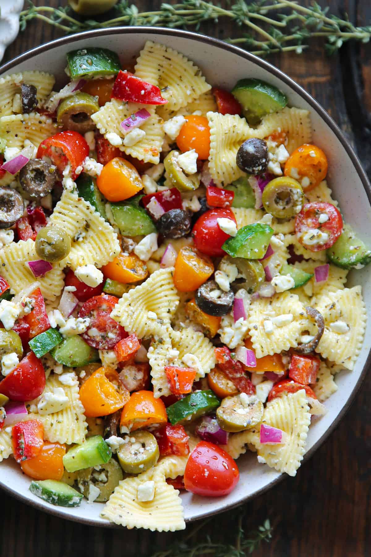Greek Pasta Salad (with tomatoes, cucumber, bell pepper, olives, red onions, and feta cheese)