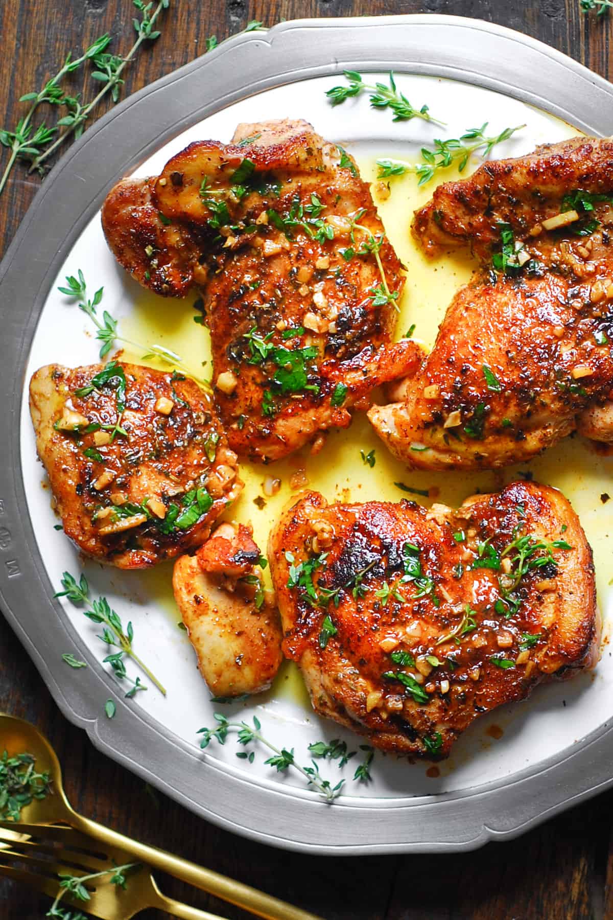 Cajun Chicken with Garlic Lemon Butter Sauce on a white plate.