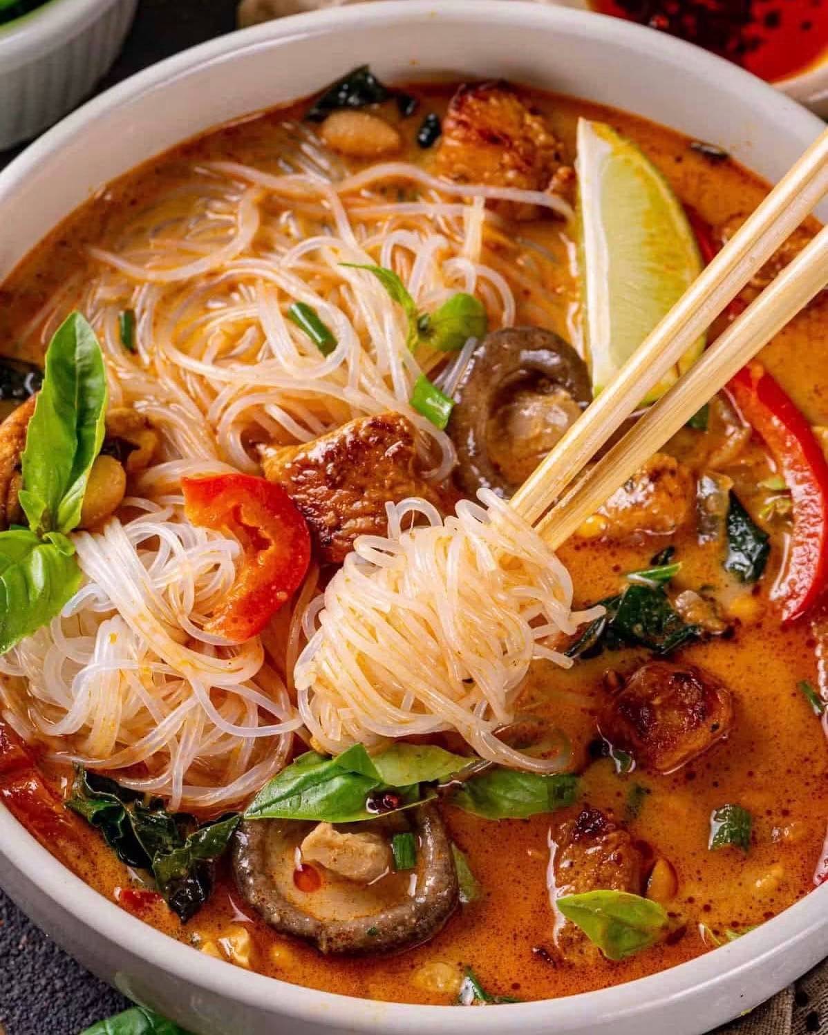 Thai Chicken Coconut Noodle Soup in a bowl.