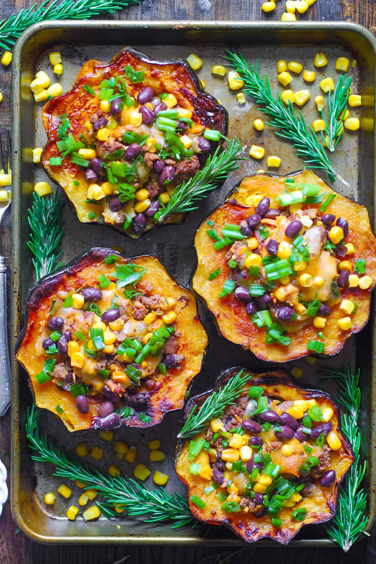 Southwestern-Style Ground Beef Stuffed Acorn Squash (with black beans, corn, mild green chiles, and green onions)