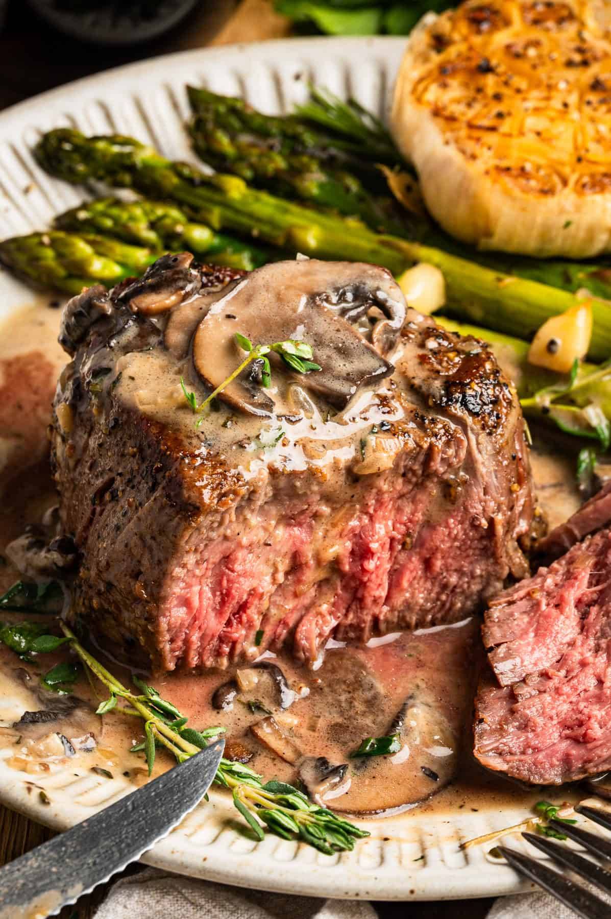 Pan-Seared Filet Mignon with Mushroom Sauce on a plate.