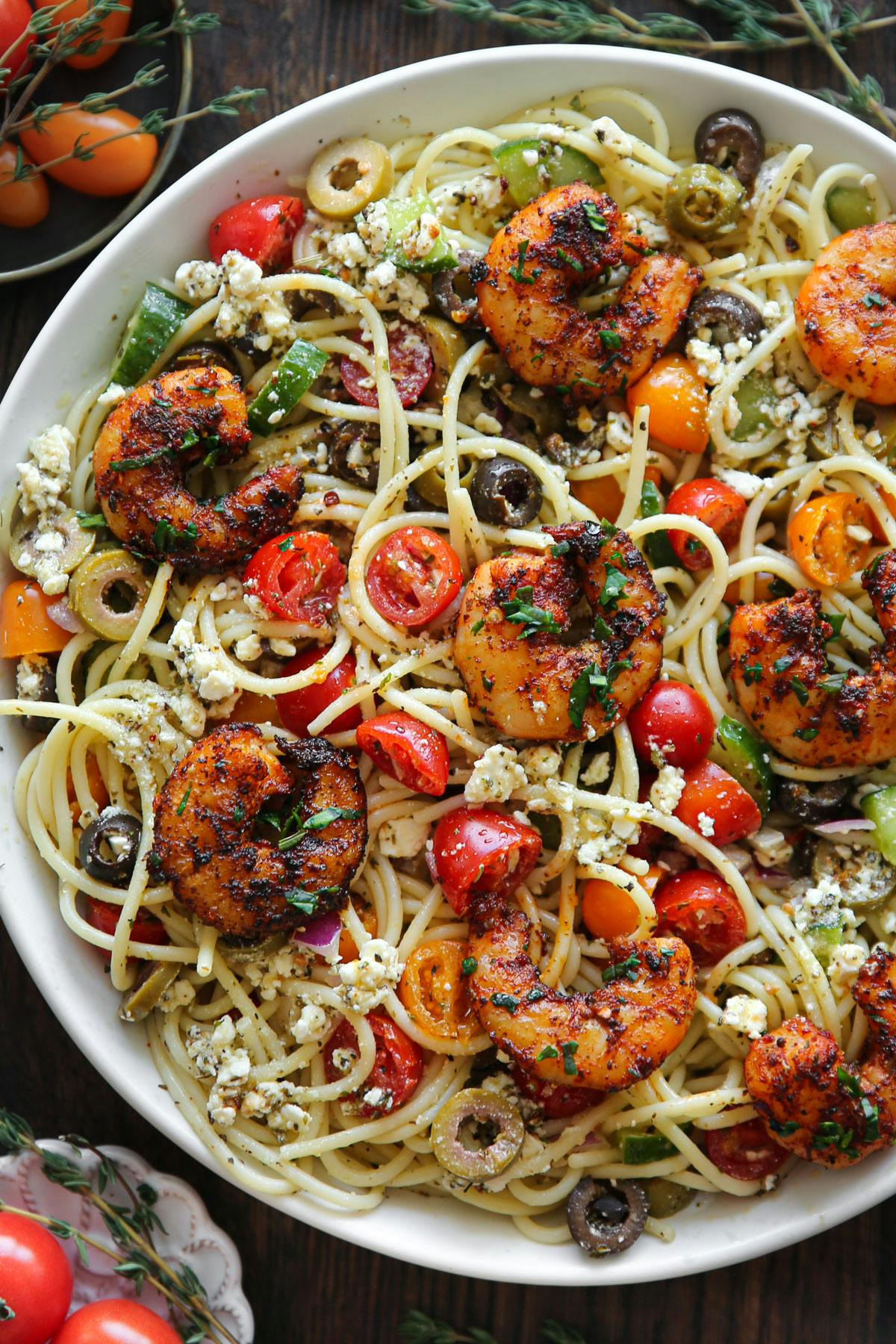 Shrimp Spaghetti with Cherry Tomatoes, Olives, Cucumber, Feta Cheese, and Lemon Garlic Sauce