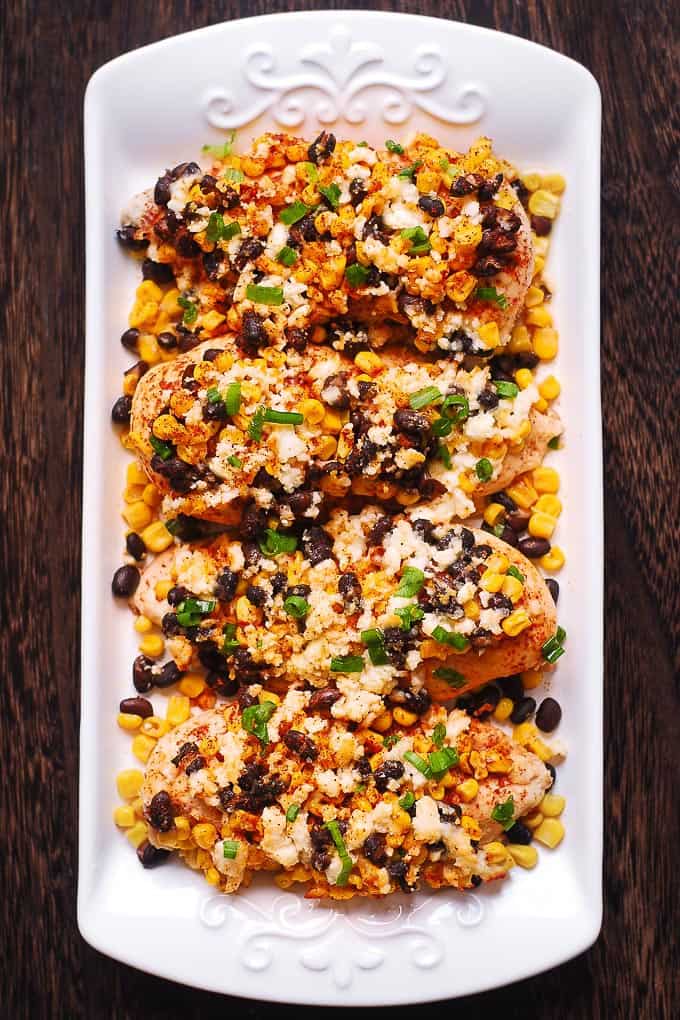 Mexican Street Corn Black Bean Chicken Bake - on a white platter.
