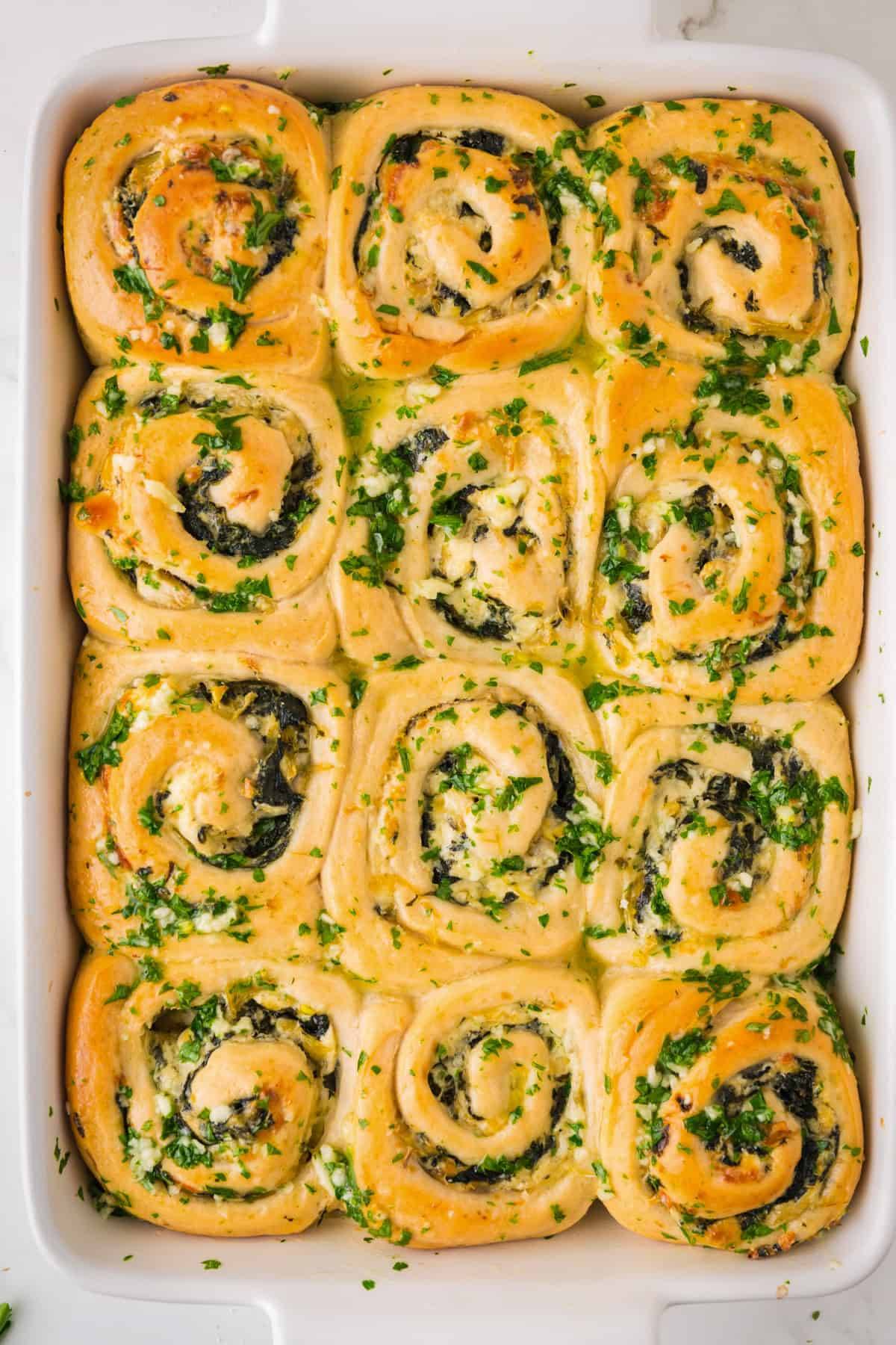 Spinach Artichoke Buns in a baking dish.