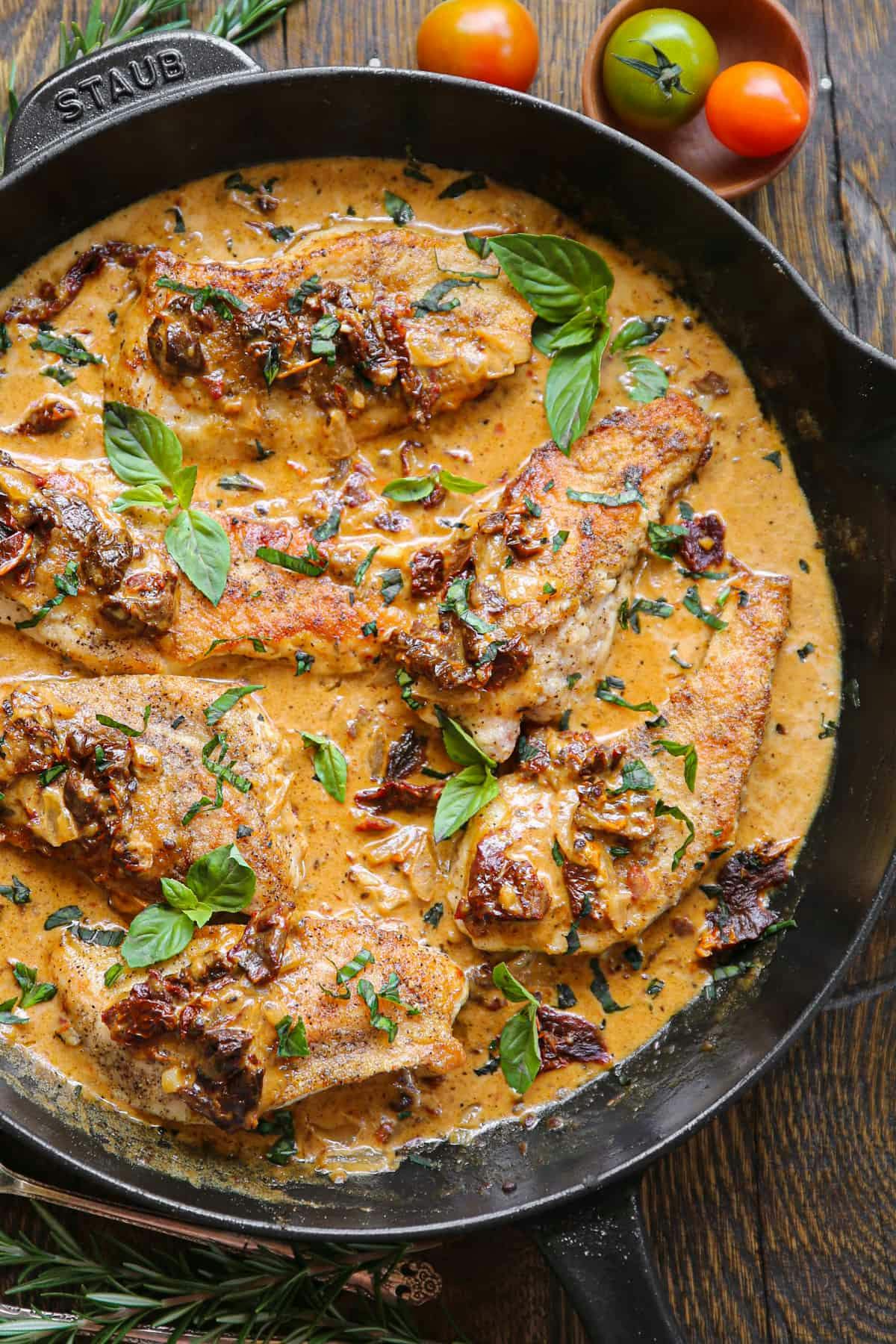 Creamy chicken with sun-dried tomatoes, fresh basil, Parmesan cheese, garlic, onion, white wine, and heavy cream.