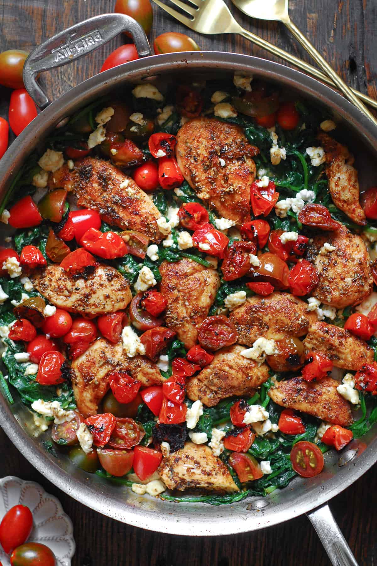 Mediterranean Chicken Stir-Fry in a stainless steel pan.